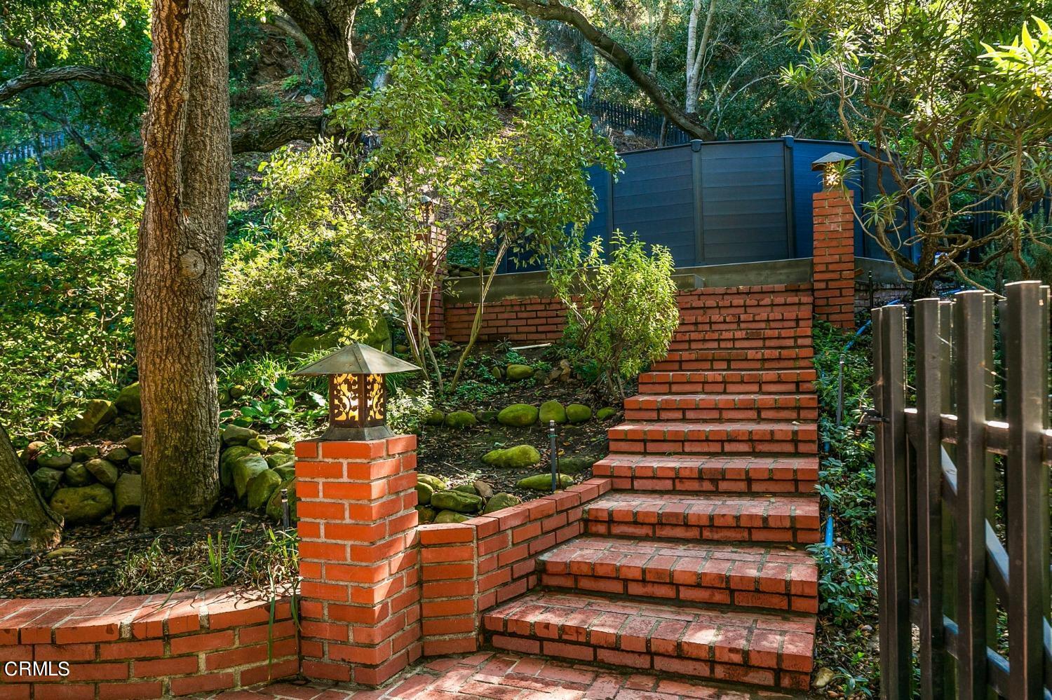 2460 Valley Meadow Drive Oak View, CA 93022 - Photo 45 of 49 a backyard of a house with lots of green space