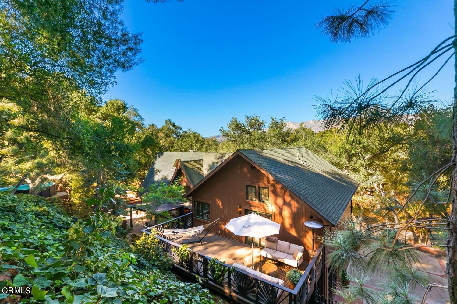2460 Valley Meadow Drive Oak View, CA 93022 - Photo 49 of 49 a view of a house with a tree in a yard