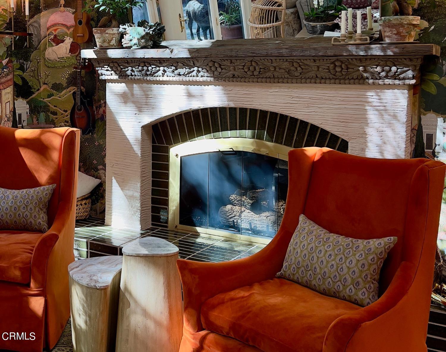 2460 Valley Meadow Drive Oak View, CA 93022 - Photo 7 of 49 a living room with furniture and a fireplace