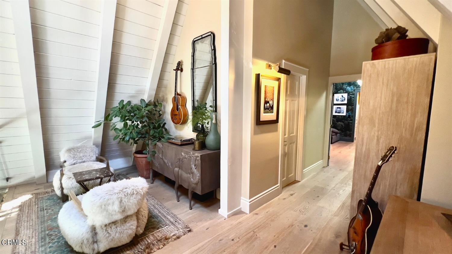 2460 Valley Meadow Drive Oak View, CA 93022 - Photo 10 of 49 a room with furniture and a potted plant