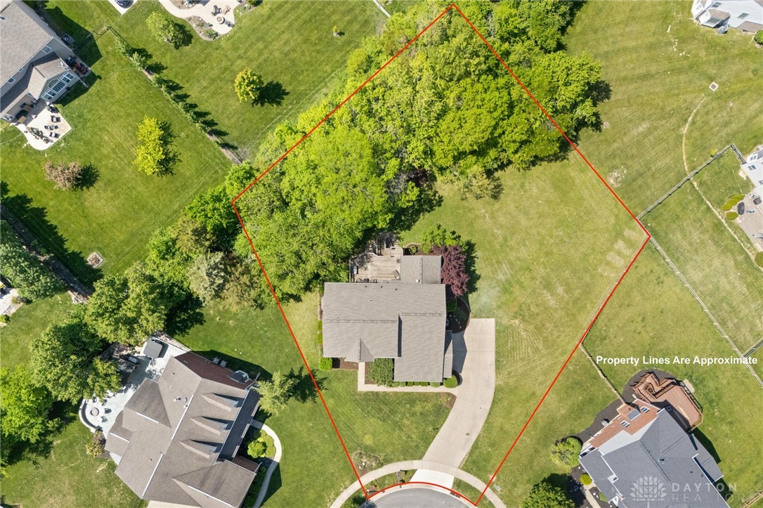 70 Martin Lane Springboro, OH 45066 - Photo 65 of 69 An aerial view showcases this spacious property with a verdant yard and mature trees.