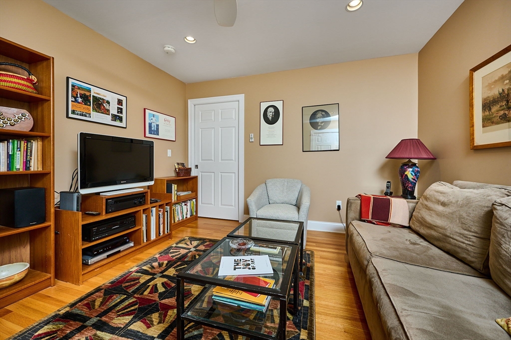 20 Bridge Road, Unit 18 Northampton, MA 01062 - Photo 19 of 42 a living room with furniture and a flat screen tv