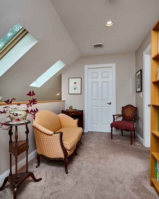 20 Bridge Road, Unit 18 Northampton, MA 01062 - Photo 22 of 42 a bed room with a bed and a chair