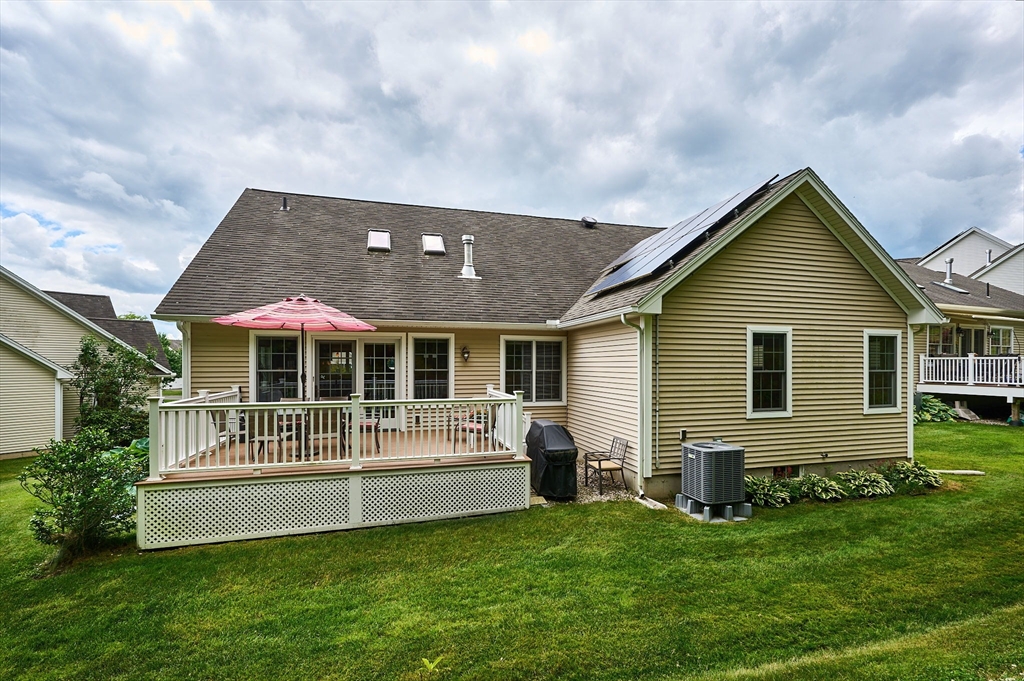 20 Bridge Road, Unit 18 Northampton, MA 01062 - Photo 32 of 42 a front view of house with yard and green space