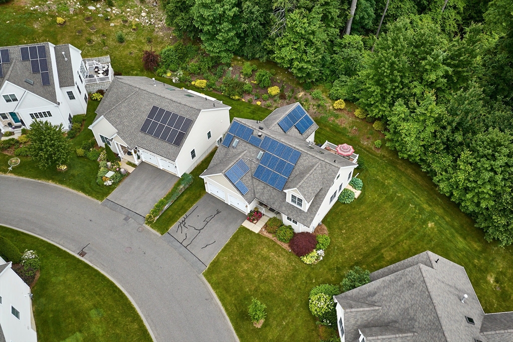 20 Bridge Road, Unit 18 Northampton, MA 01062 - Photo 36 of 42 an aerial view of a house with garden space and street view