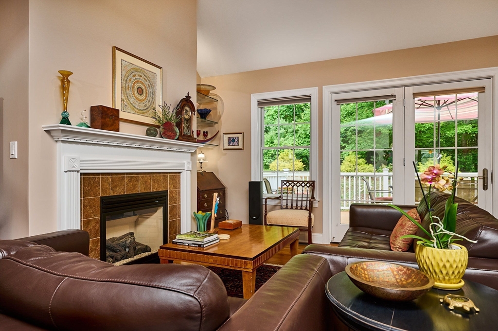 20 Bridge Road, Unit 18 Northampton, MA 01062 - Photo 5 of 42 a living room with furniture and a fireplace