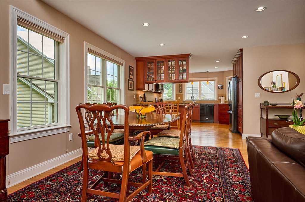 20 Bridge Road, Unit 18 Northampton, MA 01062 - Photo 9 of 42 a view of a dining room with furniture window and wooden floor