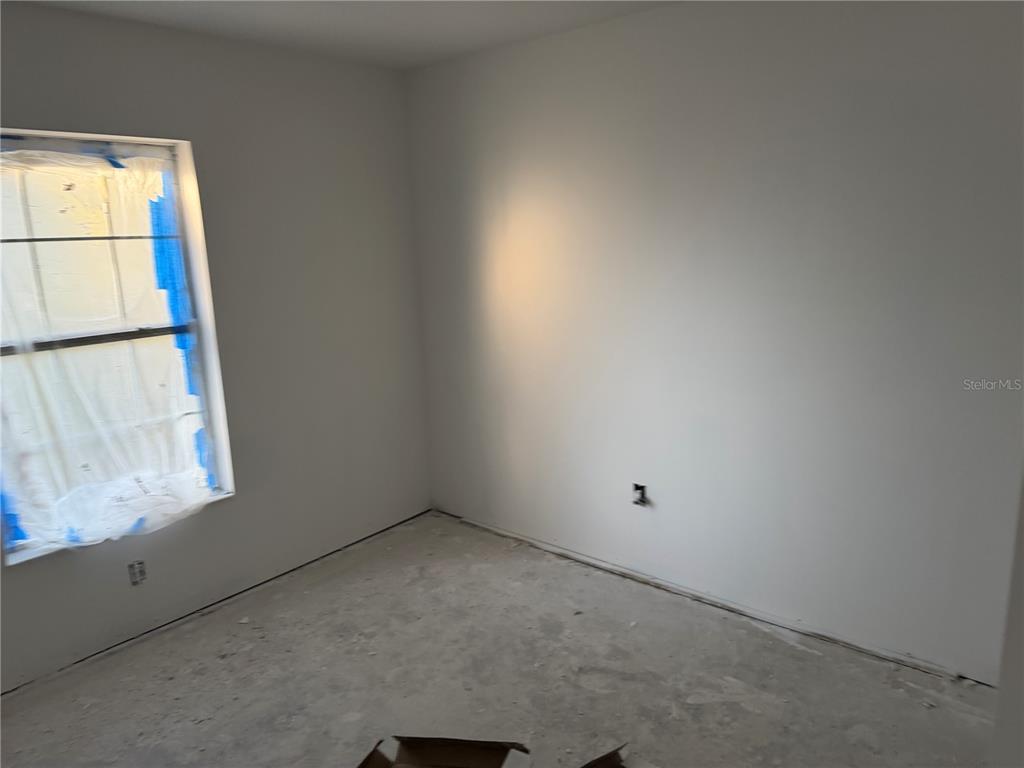 5907 Northwest 64th Street Ocala, FL 34482 - Photo 2 of 3 a view of room with window