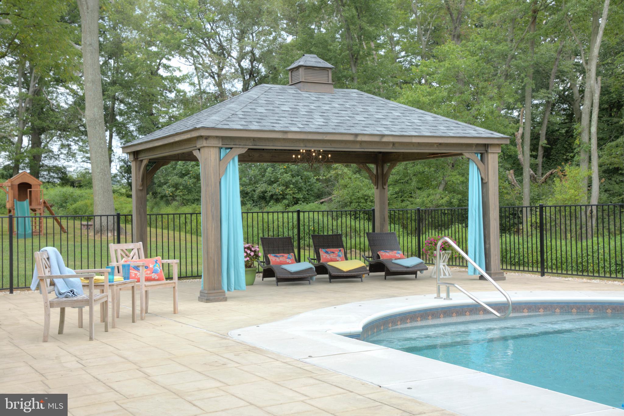 121 Old Line Drive Elkton, MD 21921 - Photo 8 of 37 Pool w/stamped concrete and gazebo.