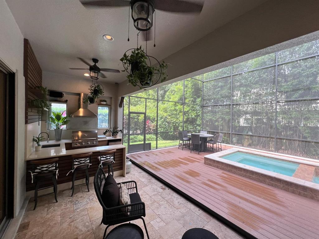 12927 Canopy Woods Way Winter Garden, FL 34787 - Photo 33 of 41 a view of a dining room with furniture window and outside view