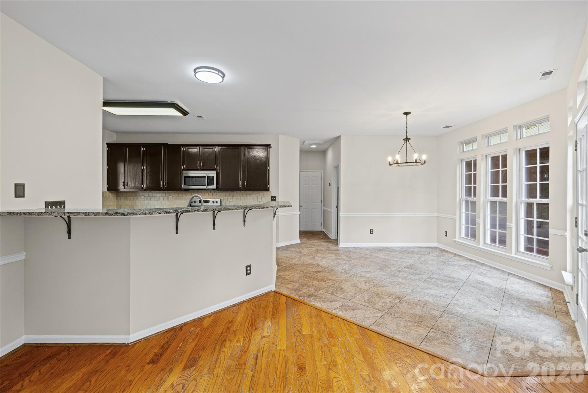620 East Cheval Drive Fort Mill, SC 29708 - Photo 14 of 48 a view of a kitchen with a sink and microwave