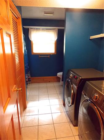 22 Dunbar Street Springfield, MA 01118 - Photo 17 of 21 a utility room with dryer and washer