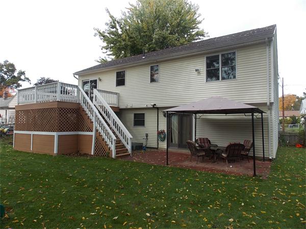 22 Dunbar Street Springfield, MA 01118 - Photo 20 of 21 a view of a house with a yard