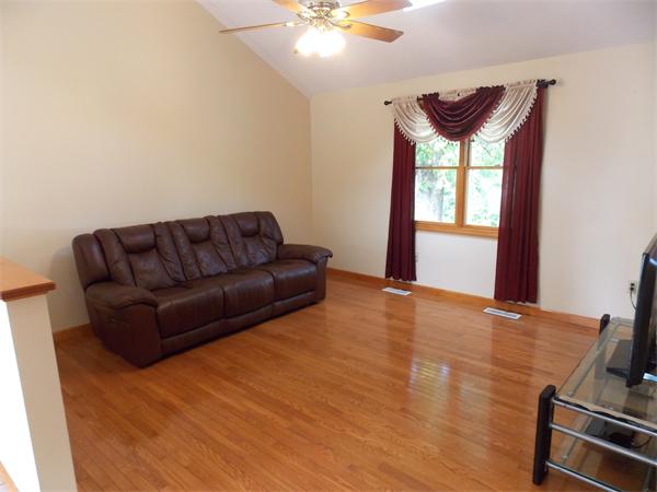 22 Dunbar Street Springfield, MA 01118 - Photo 7 of 21 a living room with furniture and a chandelier
