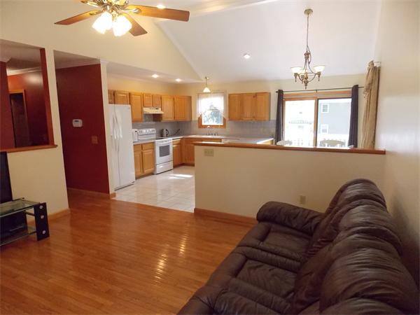 22 Dunbar Street Springfield, MA 01118 - Photo 9 of 21 a living room with furniture with kitchen view