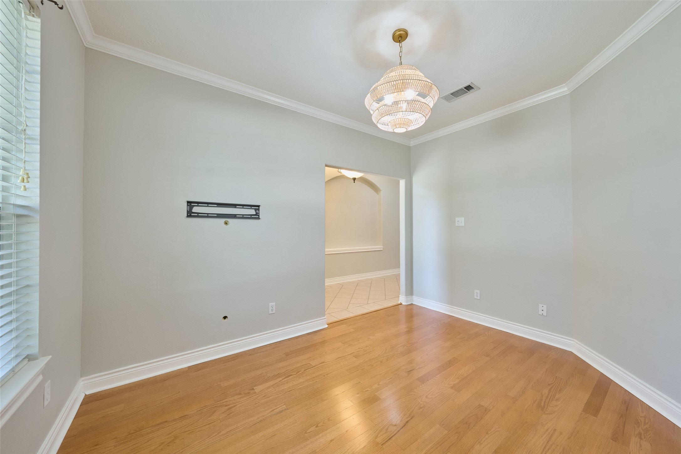 13313 Enchanted Way Montgomery, TX 77356 - Photo 9 of 36 an empty room with a large window