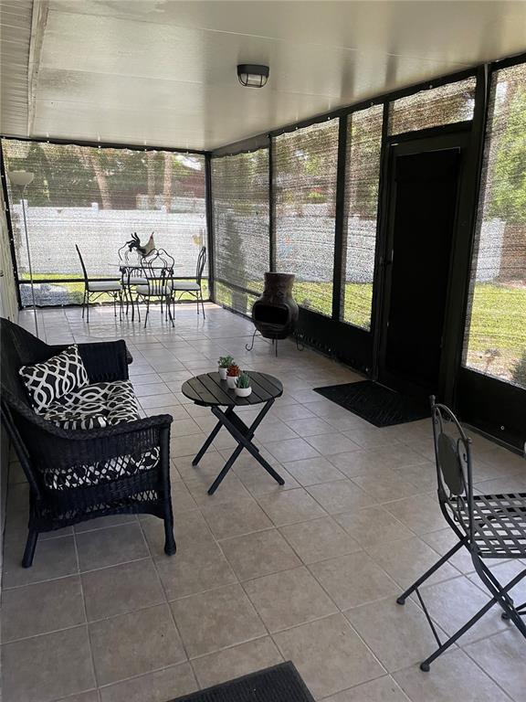 575 Tiberon Cove Road Longwood, FL 32750 - Photo 44 of 56 a living room with couches a coffee table and next to a window