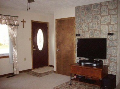 706 Fremont Road Valparaiso, IN 46385 - Photo 5 of 10 a living room with a flat screen tv and a fireplace