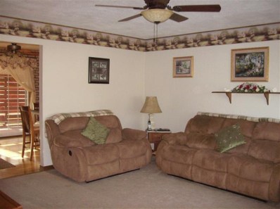 706 Fremont Road Valparaiso, IN 46385 - Photo 6 of 10 a living room with furniture and a ceiling fan