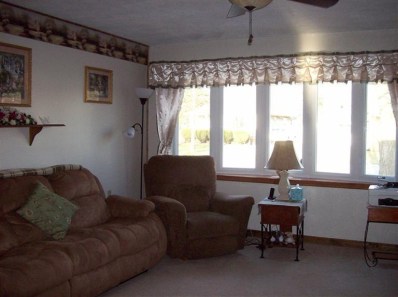 706 Fremont Road Valparaiso, IN 46385 - Photo 8 of 10 a living room with furniture and a window