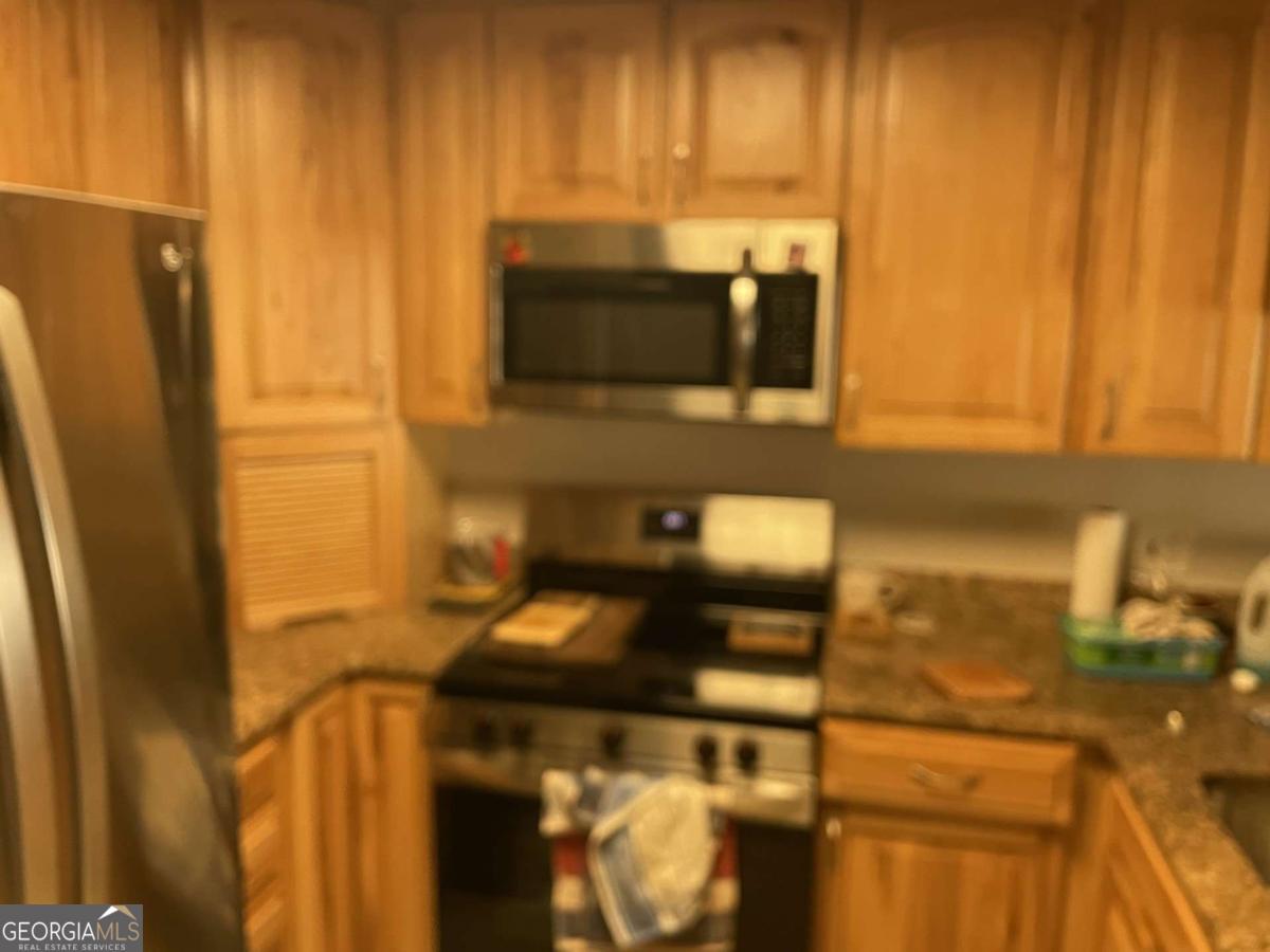 1800 Clairmont Road, Unit 223 Decatur, GA 30030 - Photo 4 of 7 a bathroom with a sink and a mirror