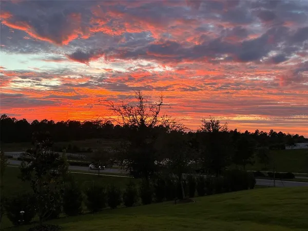 a view of a lake with a house