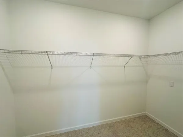 an empty room with an entryway