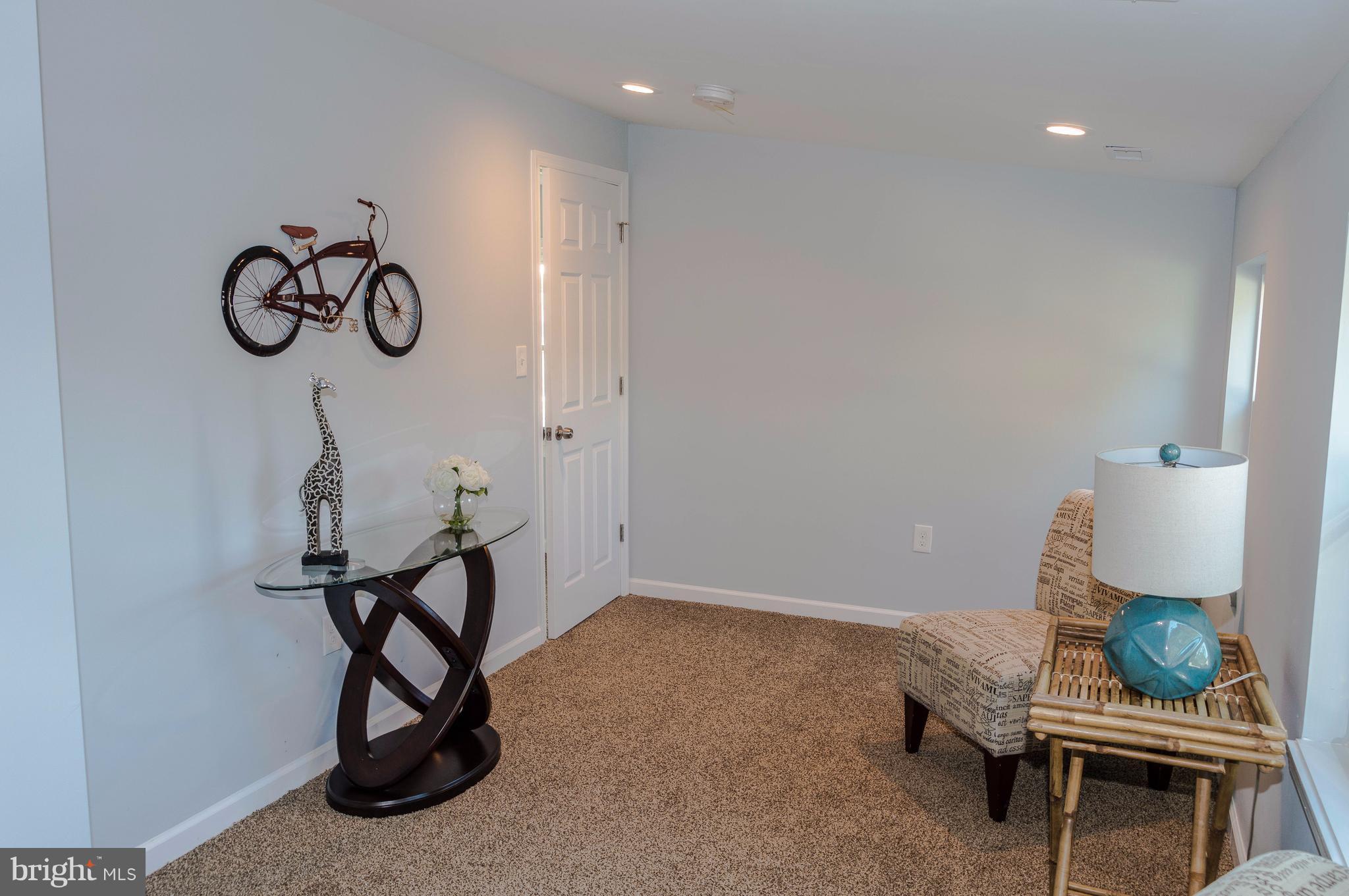 8116 Cornwall Road Baltimore, MD 21222 - Photo 8 of 22 a view of workspace with furniture and rug