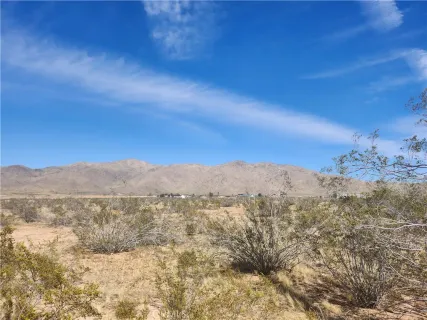 a view of mountain with outdoor space