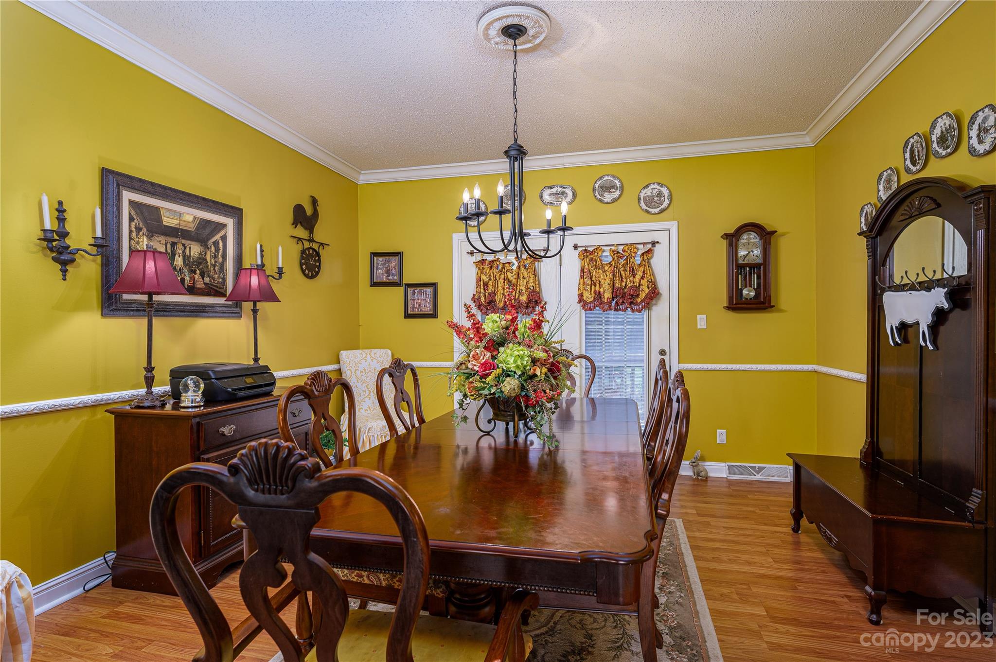 1575 Lewis Farm Road Kings Mountain, NC 28086 - Photo 13 of 42 a view of a dining room with furniture window and wooden floor
