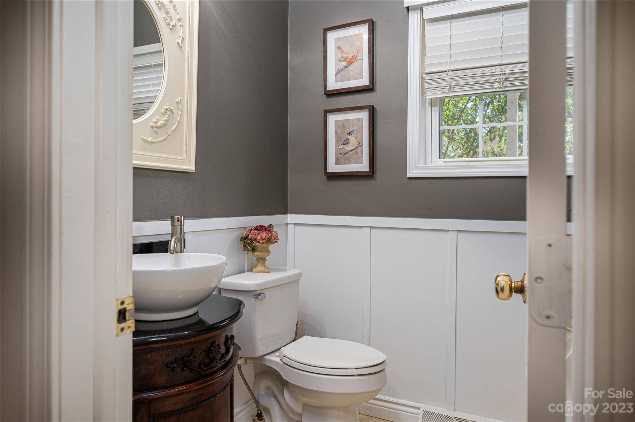 1575 Lewis Farm Road Kings Mountain, NC 28086 - Photo 14 of 42 a bathroom with a toilet a sink and a window