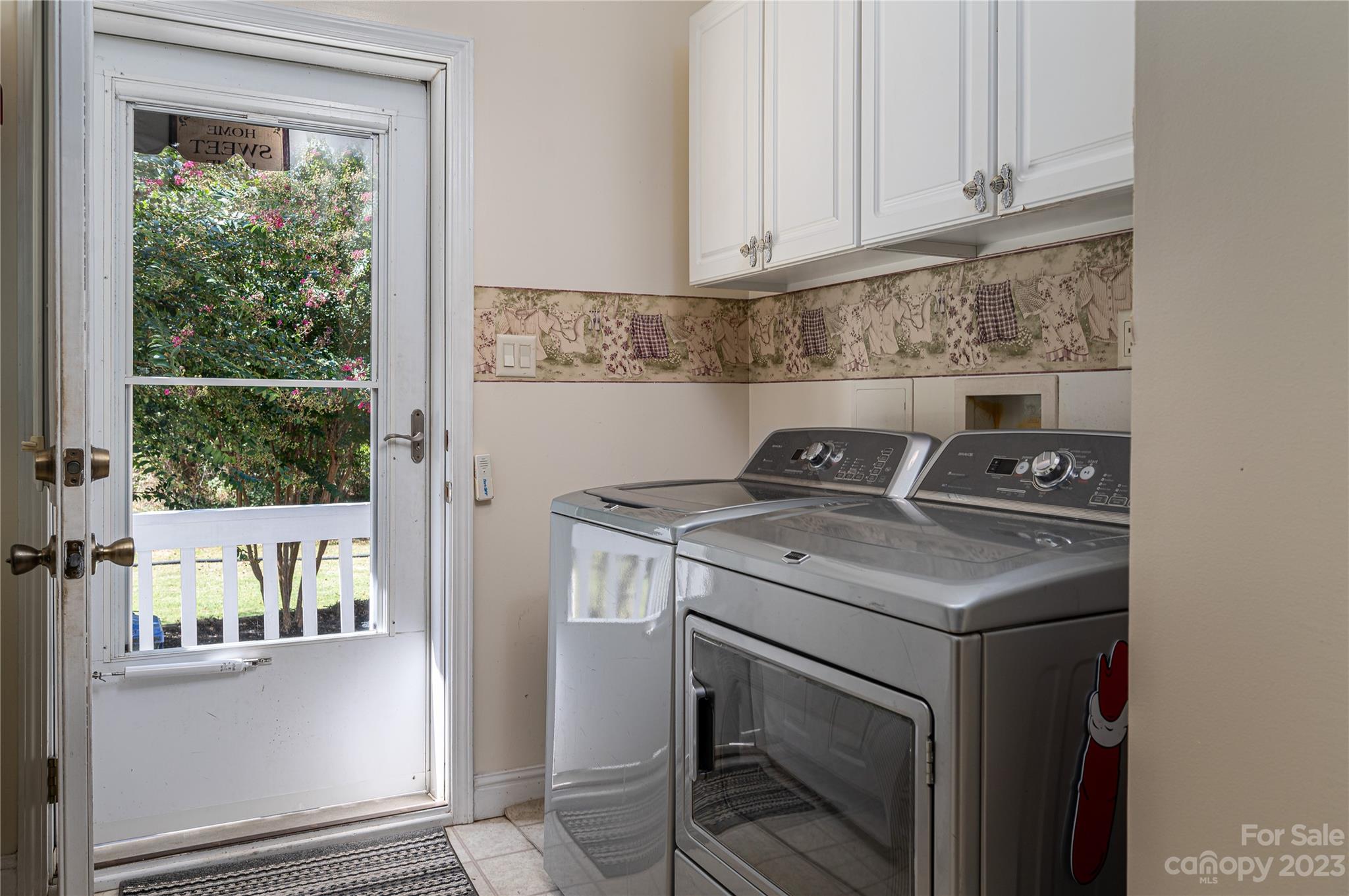 1575 Lewis Farm Road Kings Mountain, NC 28086 - Photo 15 of 42 a view of washer and dryer with kitchen countertops