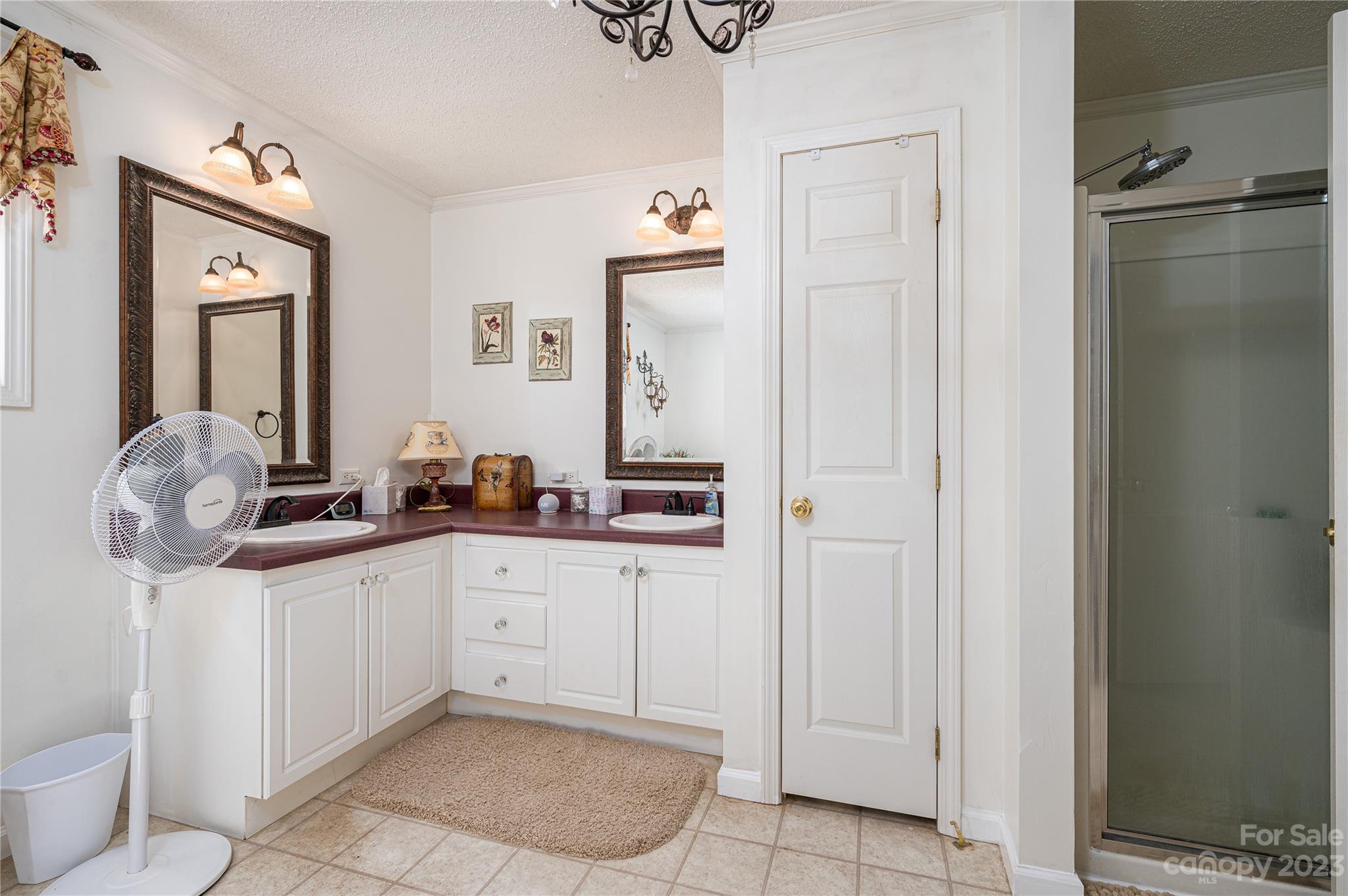 1575 Lewis Farm Road Kings Mountain, NC 28086 - Photo 19 of 42 a bathroom with a sink a mirror and a shower