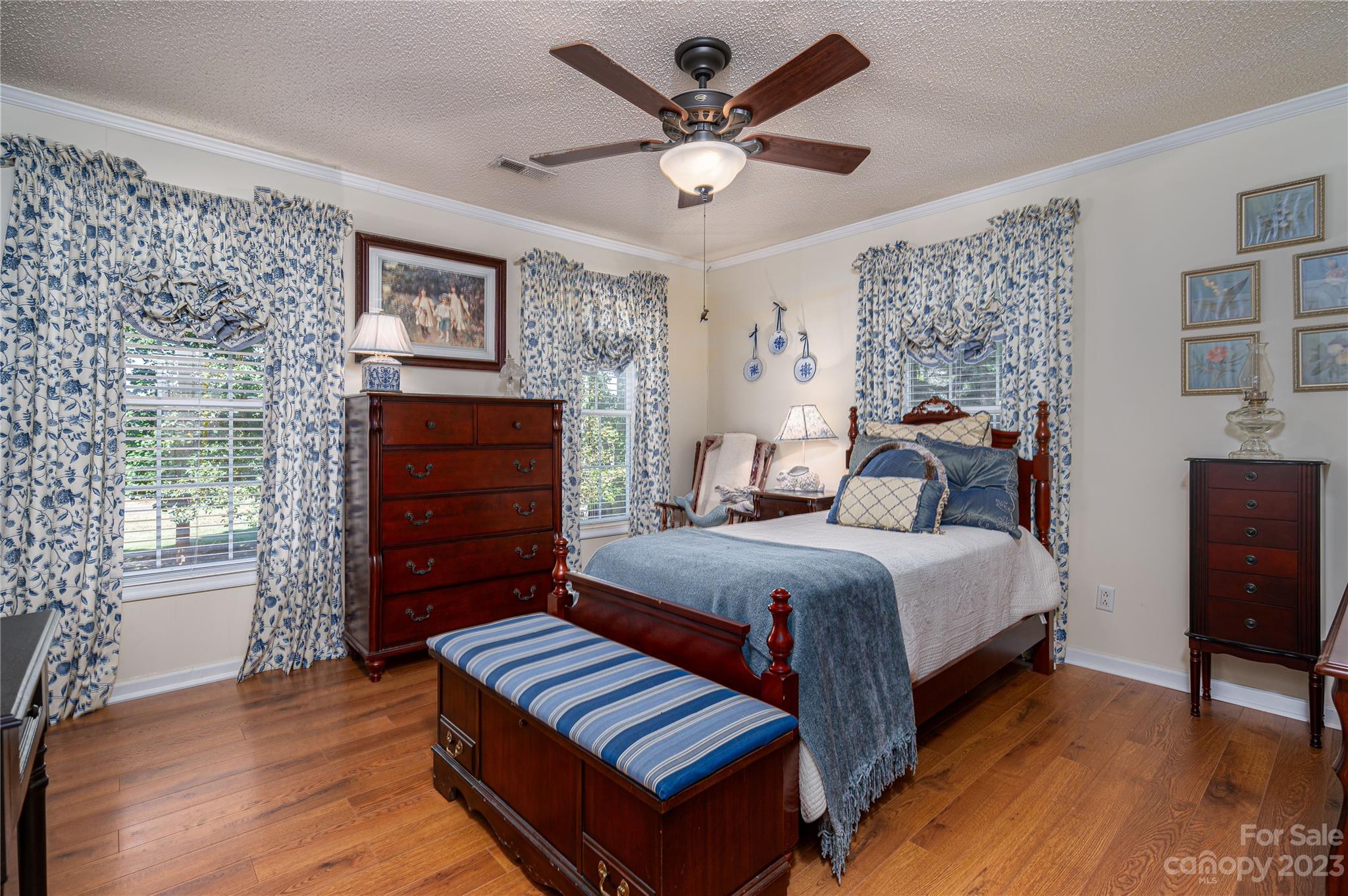 1575 Lewis Farm Road Kings Mountain, NC 28086 - Photo 20 of 42 a bedroom with a bed and a dresser