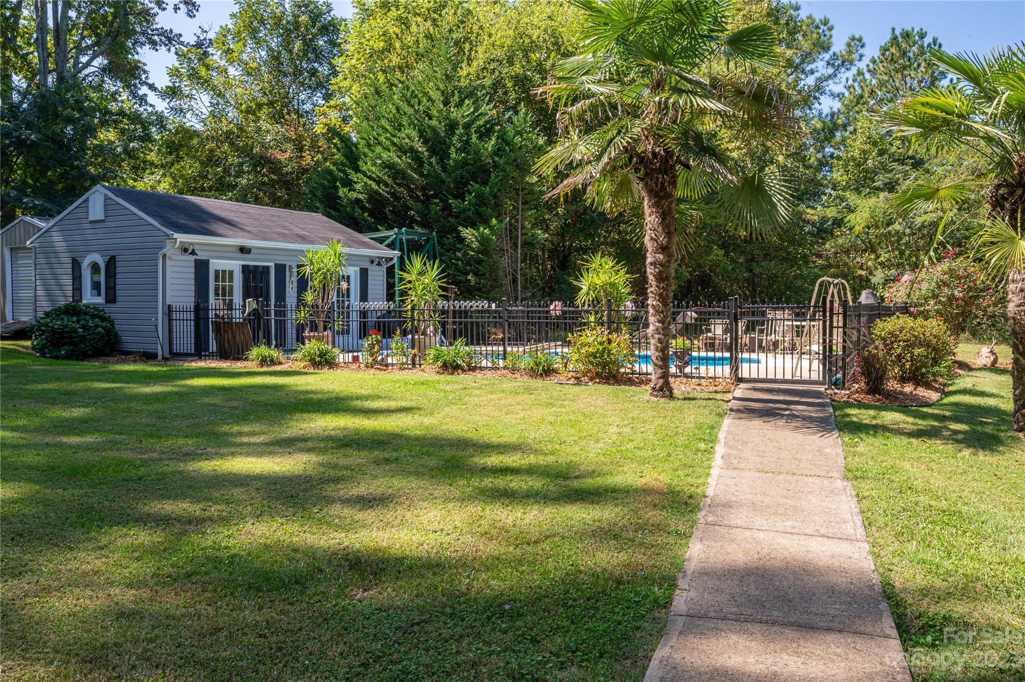 1575 Lewis Farm Road Kings Mountain, NC 28086 - Photo 28 of 42 a front view of a house with garden