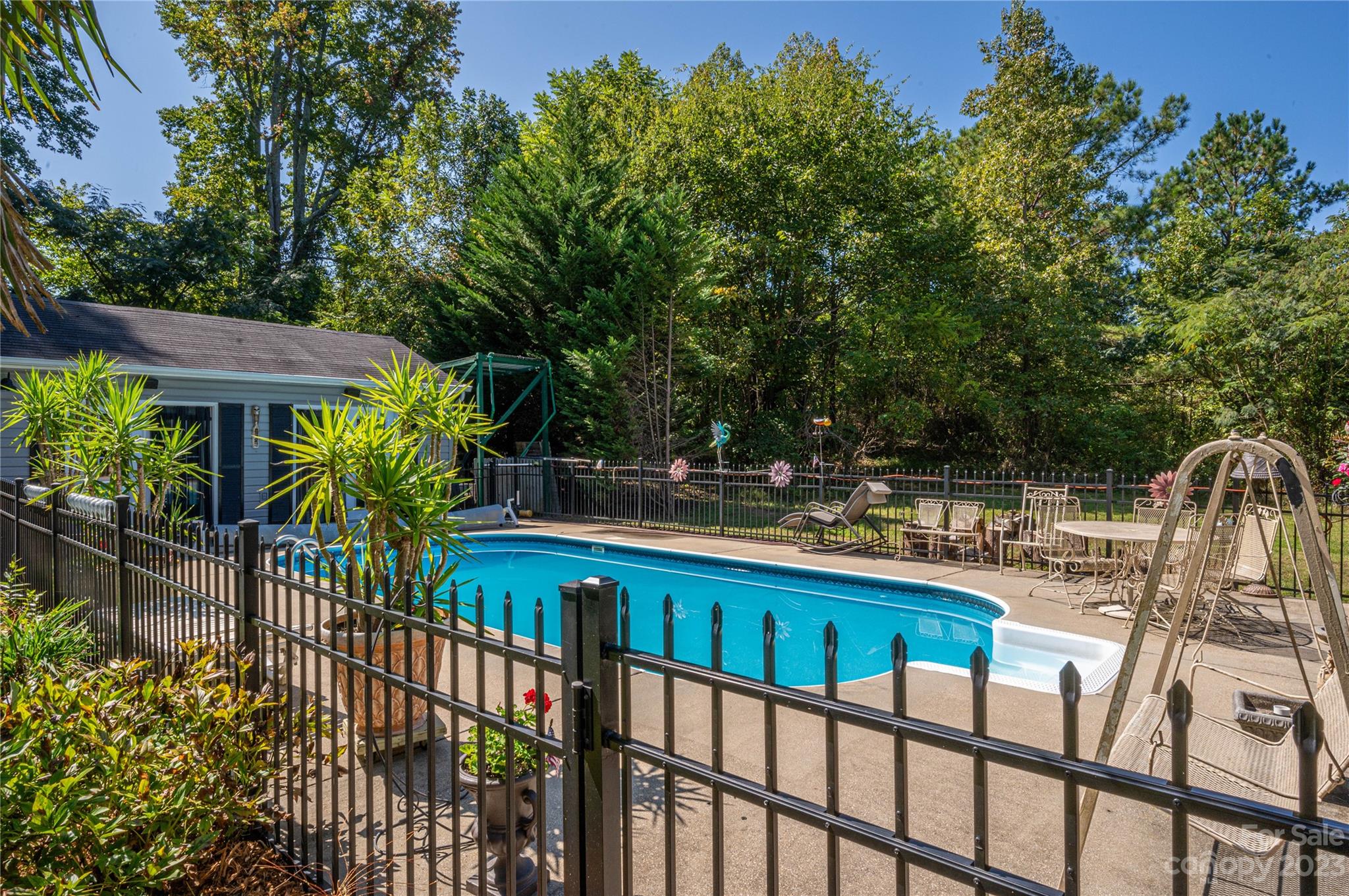 1575 Lewis Farm Road Kings Mountain, NC 28086 - Photo 29 of 42 a view of a chair and tables in the balcony