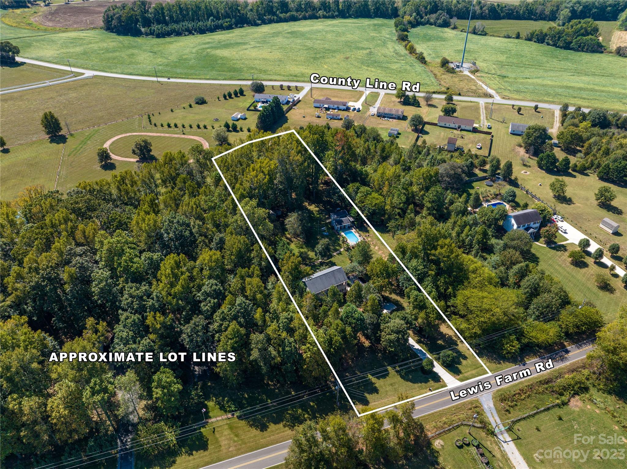 1575 Lewis Farm Road Kings Mountain, NC 28086 - Photo 39 of 42 an aerial view of a tennis court