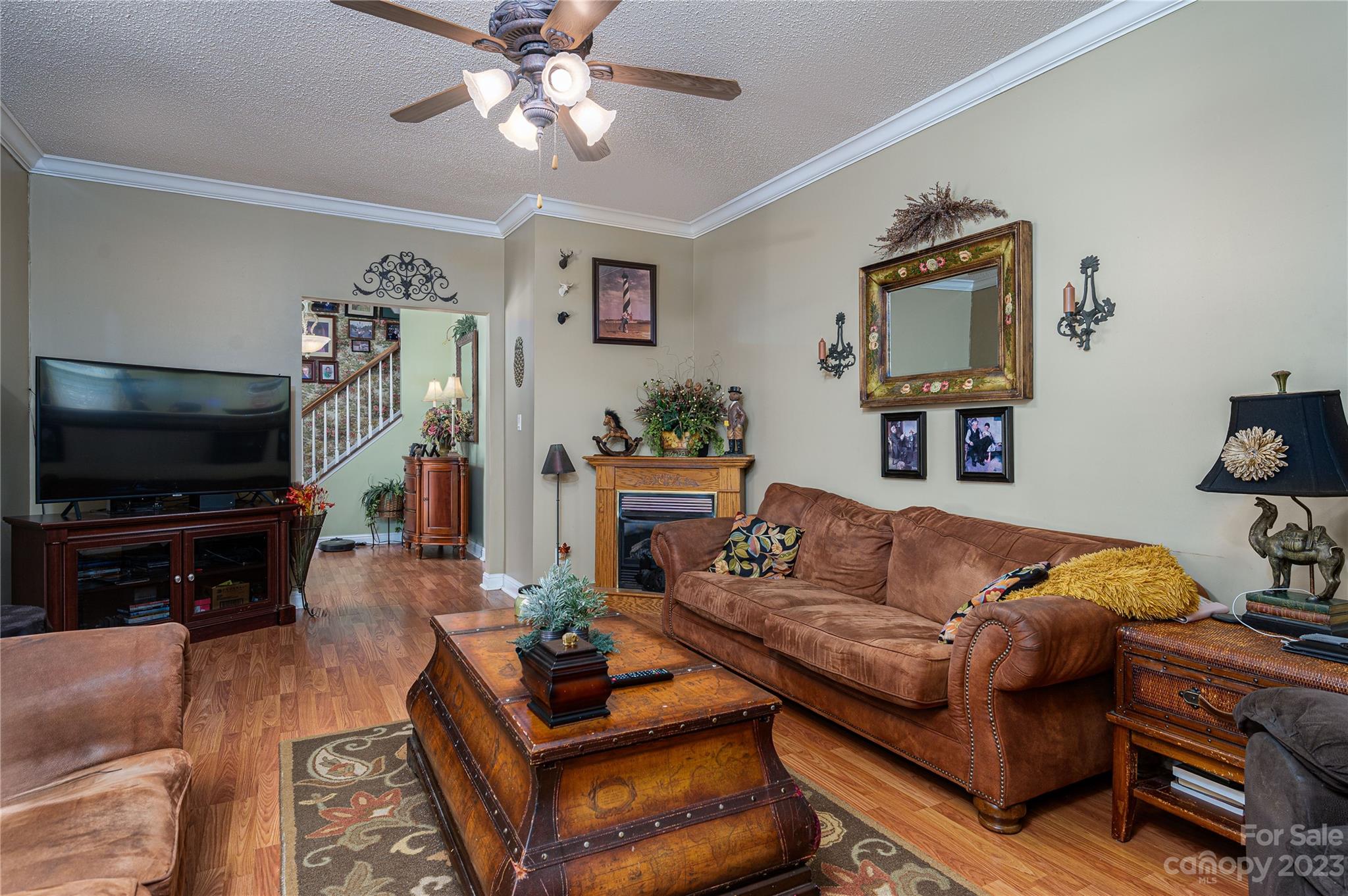 1575 Lewis Farm Road Kings Mountain, NC 28086 - Photo 5 of 42 a living room with furniture and a flat screen tv