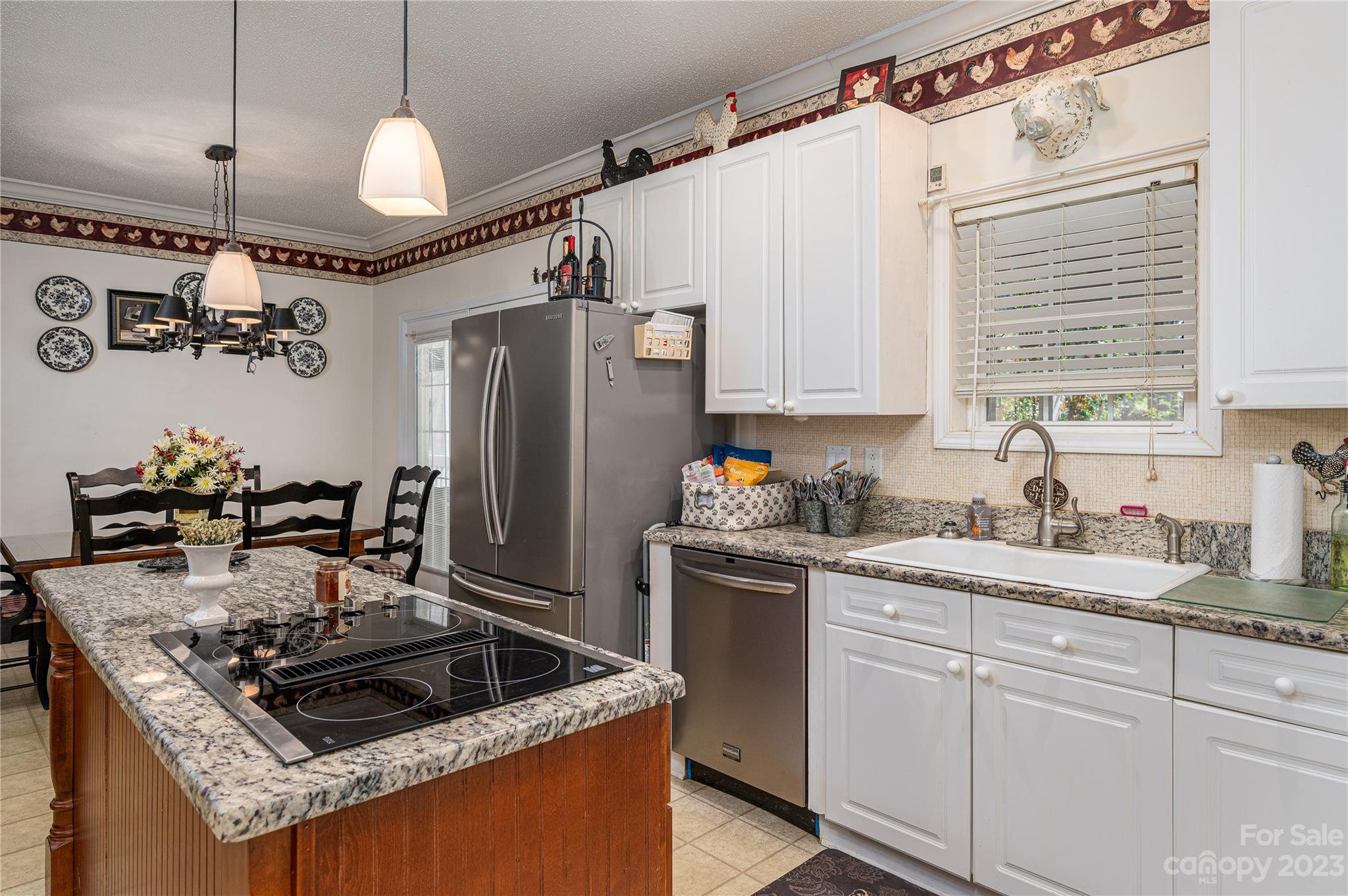 1575 Lewis Farm Road Kings Mountain, NC 28086 - Photo 7 of 42 a kitchen with stainless steel appliances granite countertop a sink stove and refrigerator
