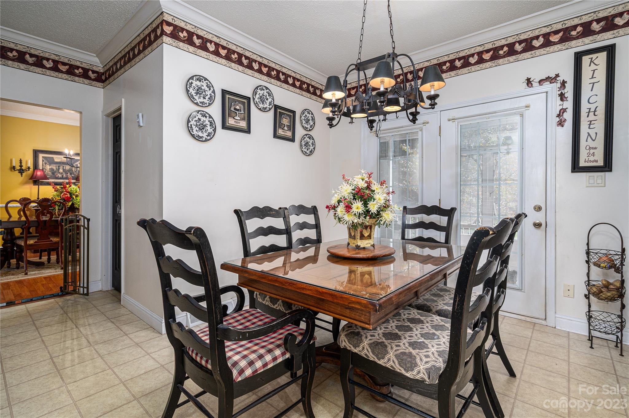 1575 Lewis Farm Road Kings Mountain, NC 28086 - Photo 9 of 42 a view of a dining room with furniture and chandelier