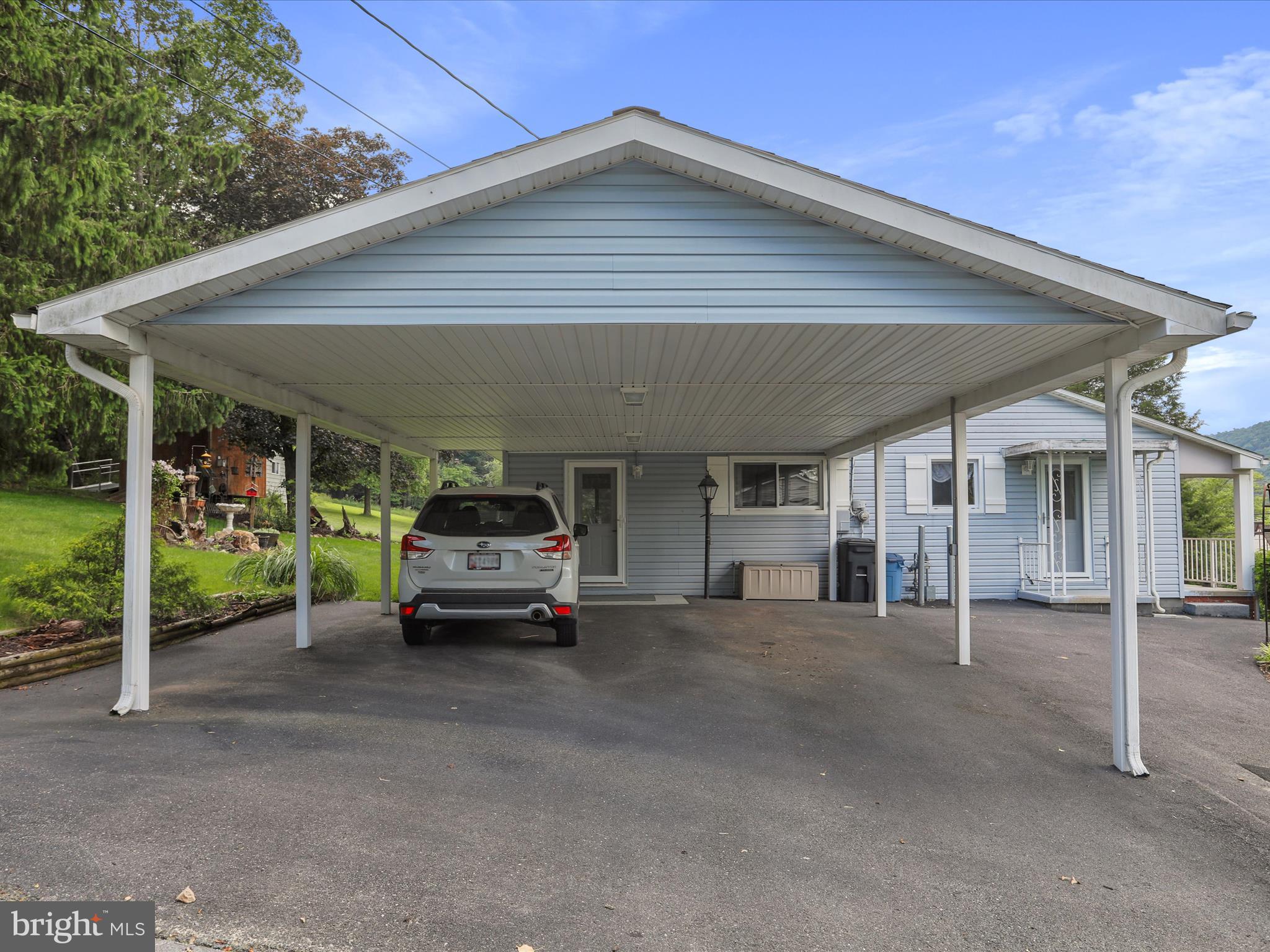 10908 Cash Valley Road Northwest La Vale, MD 21502 - Photo 3 of 34 2 car carport + parking for 3rd car to the right!