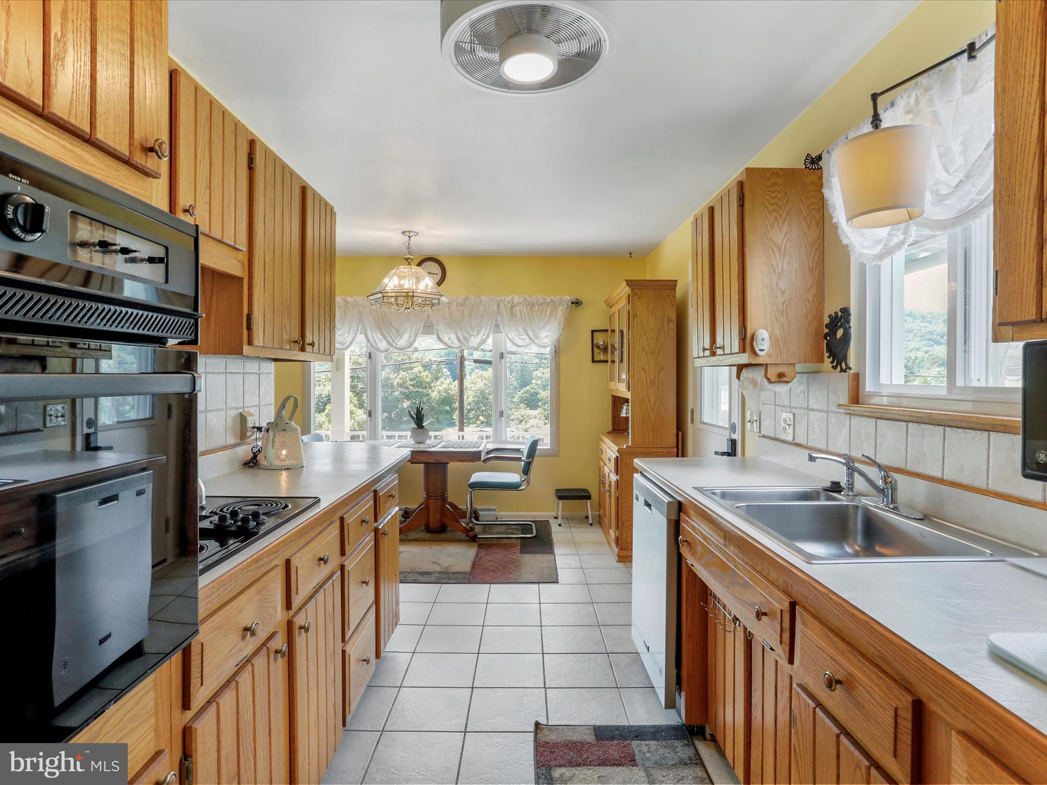 10908 Cash Valley Road Northwest La Vale, MD 21502 - Photo 9 of 34 Ceramic tile floors and fandolier here!