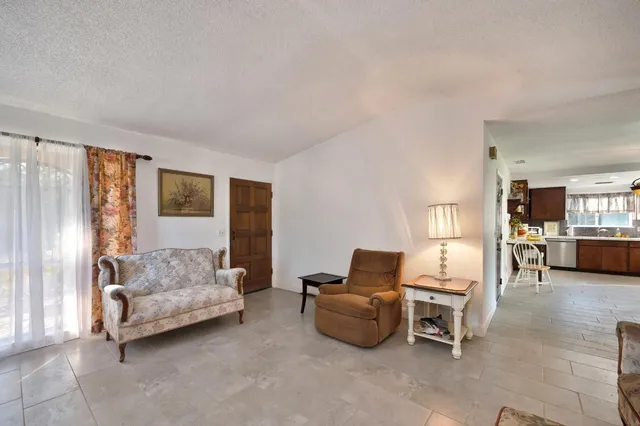 a bedroom with furniture and a couch