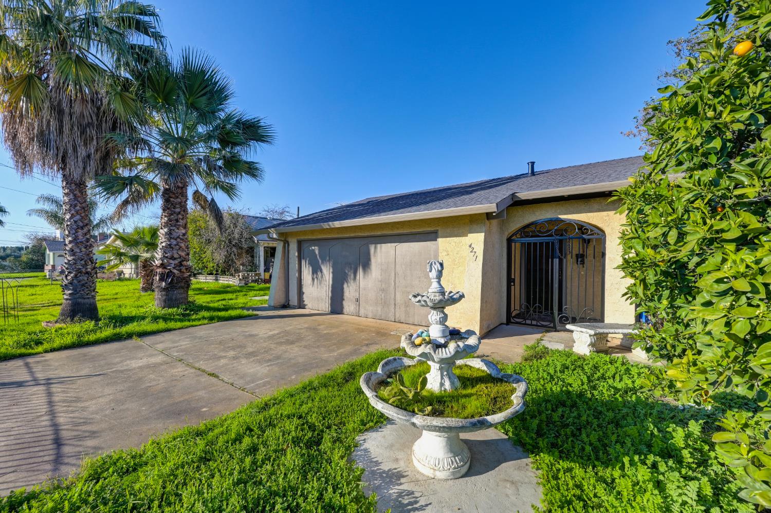 4271 Soledad Avenue Sacramento, CA 95820 - Photo 2 of 36 a front view of a house with garden and patio