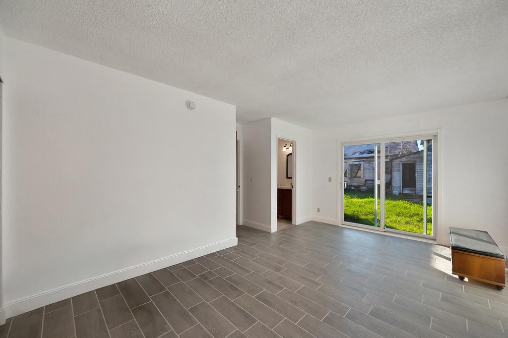 4271 Soledad Avenue Sacramento, CA 95820 - Photo 25 of 36 a view of an empty room with a window