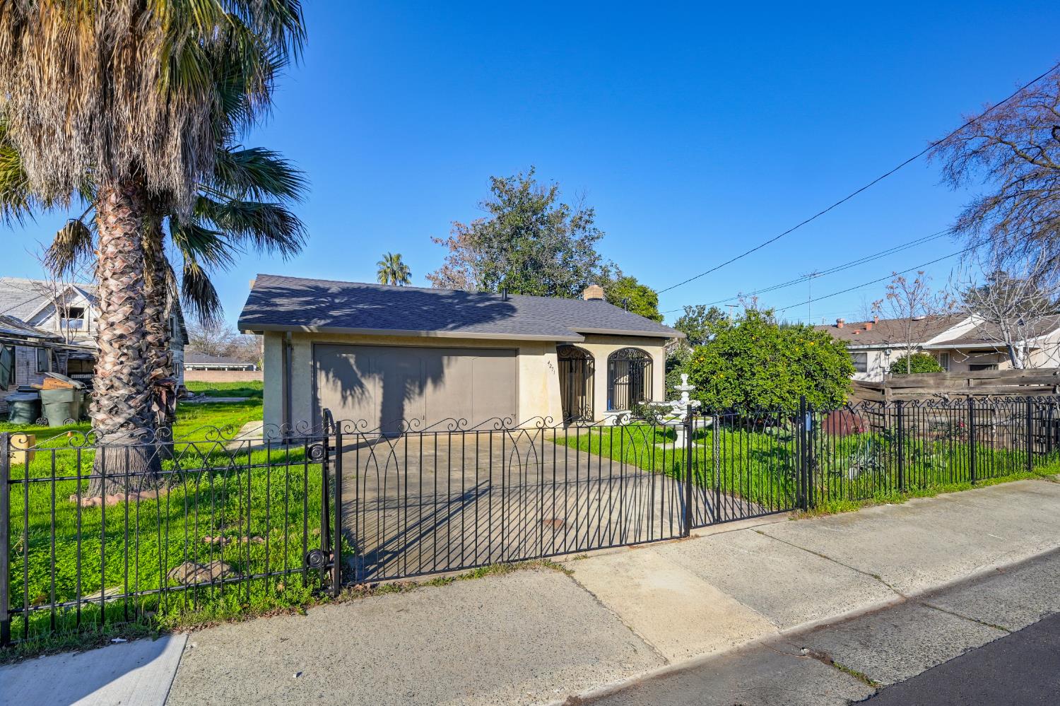 4271 Soledad Avenue Sacramento, CA 95820 - Photo 6 of 36 a front view of a house with a garden and entryway