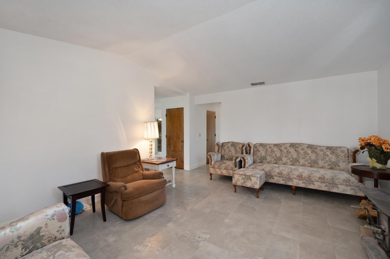 4271 Soledad Avenue Sacramento, CA 95820 - Photo 10 of 36 a living room with furniture and a couch