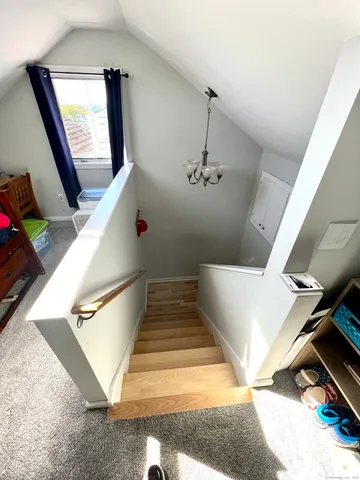 a view of entryway and kitchen