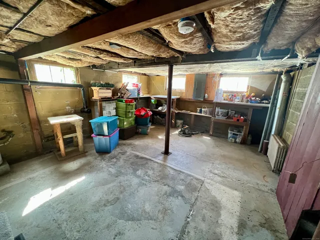 a view of a garage with chairs