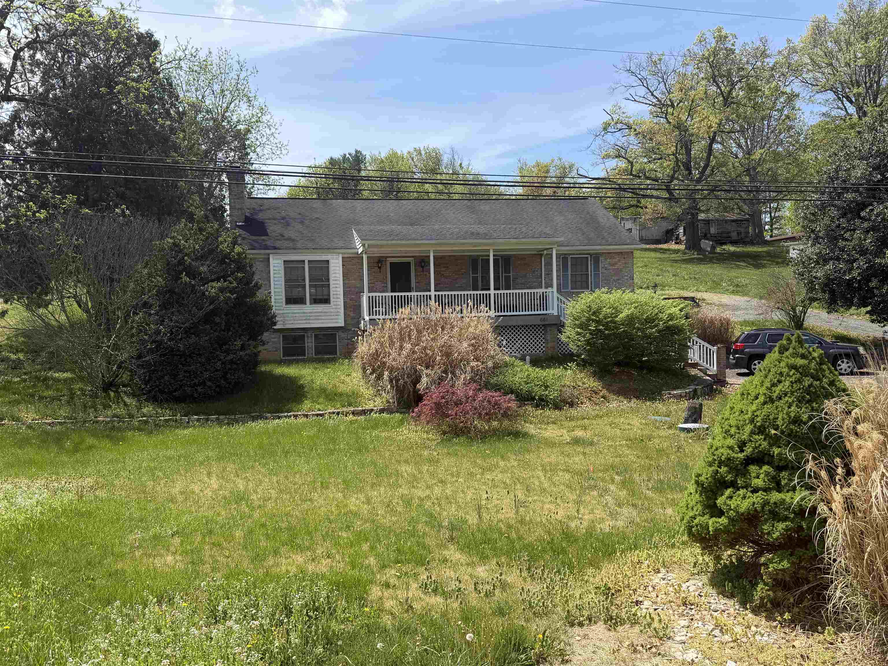 661 Ladd Road Fishersville, VA 22939 - Photo 2 of 14 a view of a house with a garden